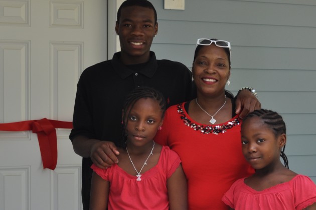 Women Build II Dedication- family with ribbon-001
